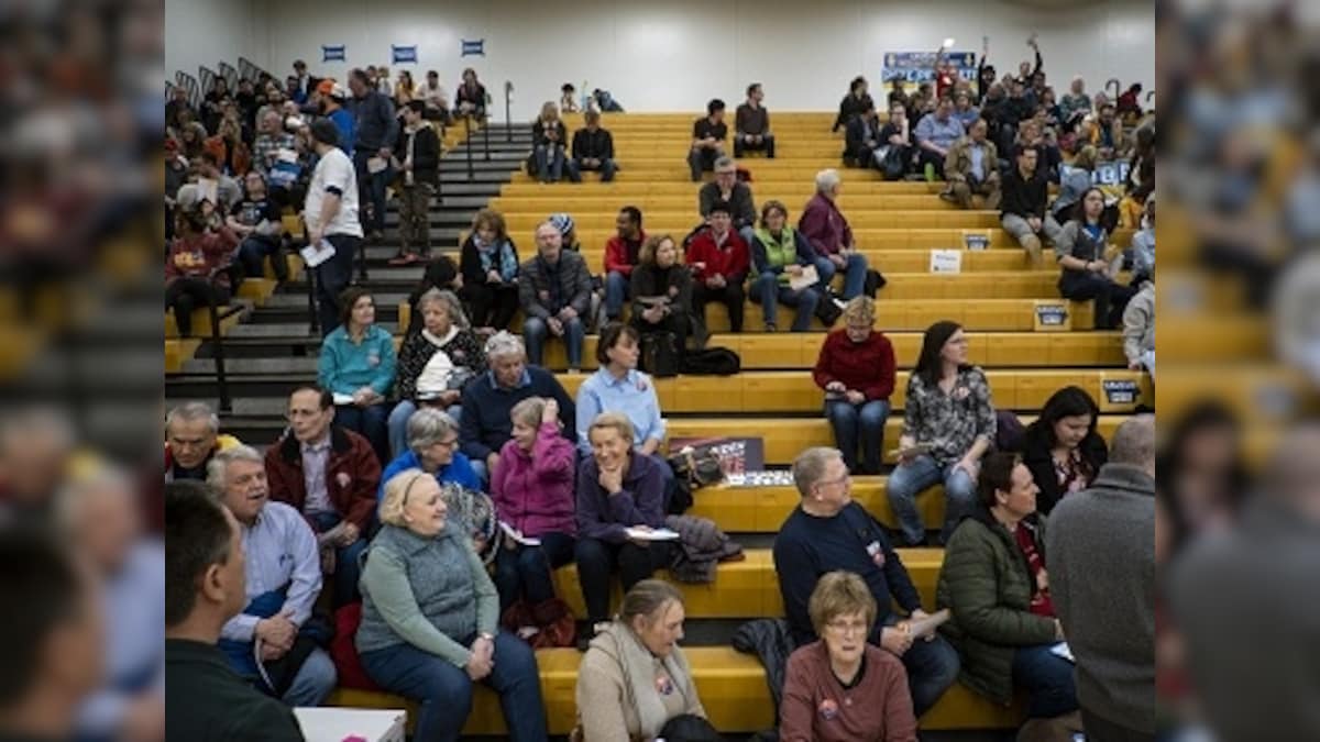 Delays mar Iowa caucuses as Democrats begin nomination process ahead of US presidential primaries