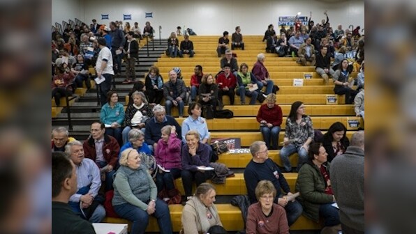 Delays mar Iowa caucuses as Democrats begin nomination process ahead of US presidential primaries