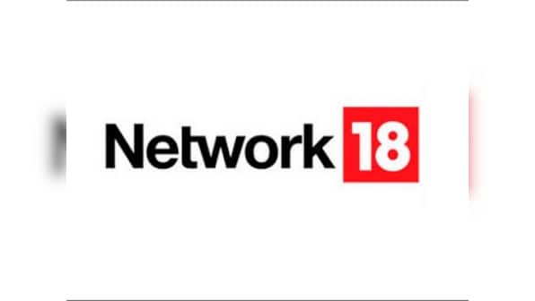 RIL trades marginally lower after announcement of consolidation of business; shares of 3 group entities surge