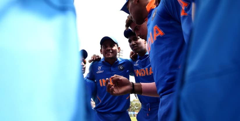 Priyam Garg in conversation with his teammates during a match at U19 World Cup. Photo ICC