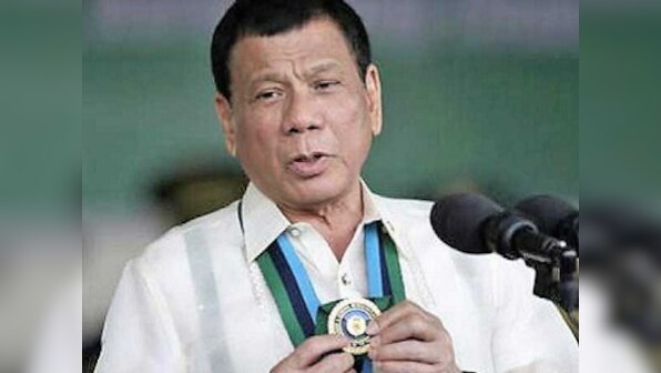 Philippines accuses China of firing water cannon at its boats, warns Beijing to 'back off'