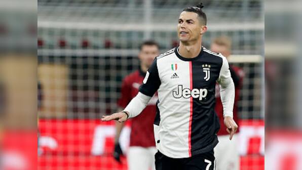 Coppa Italia: Cristiano Ronaldo's stoppage time penalty earns Juventus hard-fought draw in semi-final first leg against 10-man AC Milan
