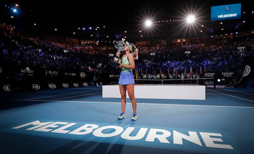 Sofia Kenin kisses the Daphne Akhurst Memorial Cup after defeating Garbine Muguruza in the women’s singles final at the Australian Open on Saturday. AP Photo