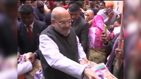 Delhi Assembly election: Arvind Kejriwal holds roadshows at Kirari, Mundka today; Amit Shah, JP Nadda conduct door-to-door campaigns week ahead of polls