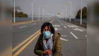 'Please take my daughter': Amid coronavirus outbreak in China, mother of cancer patient struggles to get child past blockade
