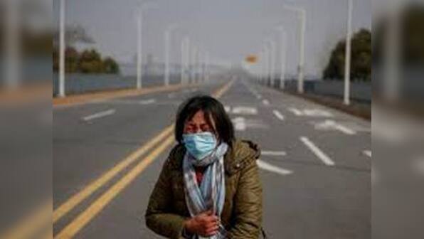 'Please take my daughter': Amid coronavirus outbreak in China, mother of cancer patient struggles to get child past blockade