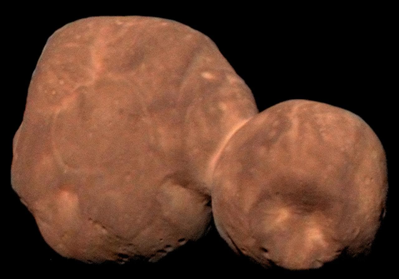 Arrokoth is a planet that is comprised of two lobes looking somewhat like giant wheels of cheese fused together by a bridge. Image credit: NASA
