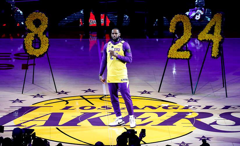 Los Angeles Lakers' LeBron James, wearing a No. 24 jersey, speaks about Kobe Bryant prior to an NBA game between the Lakers and the Portland Trail Blazers on Friday, Jan. 31, 2020, in Los Angeles. Bryant, the 18-time NBA All-Star who won five championships and became one of the greatest basketball players of his generation during a 20-year career with the Lakers, died in a helicopter crash Sunday. (AP Photo/Ringo H.W. Chiu)
