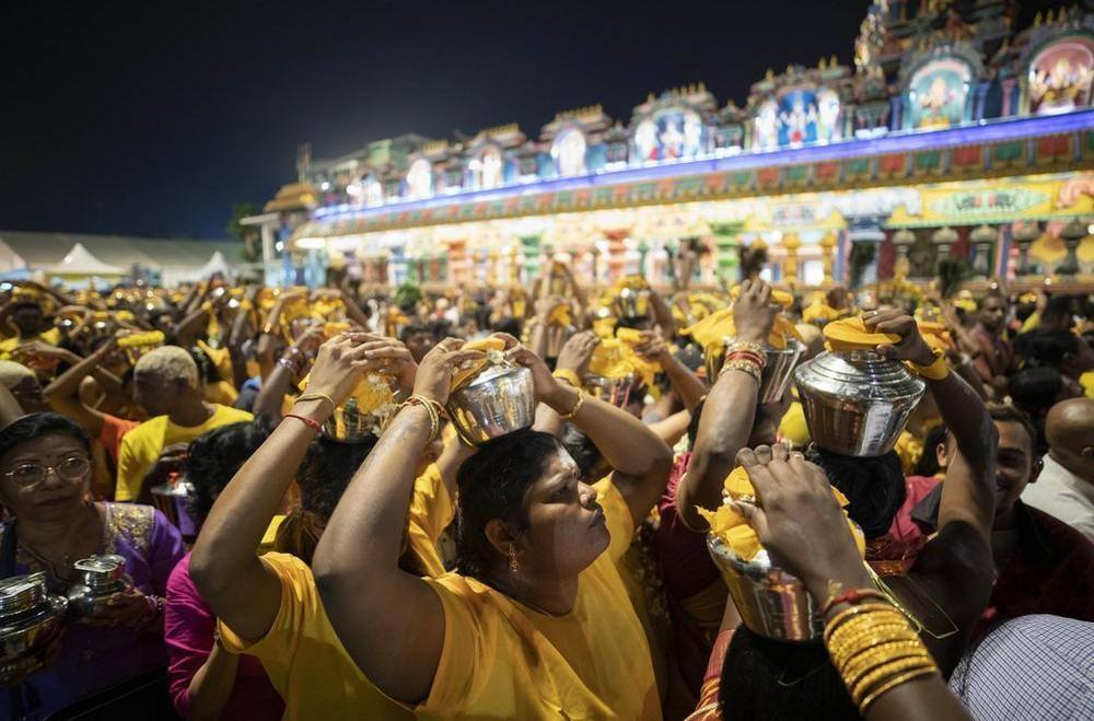 ens of thousands of ethnic Hindus, meanwhile, gathered last weekend to celebrate the annual festival, undeterred by the outbreak of a new virus. Image credit: AP