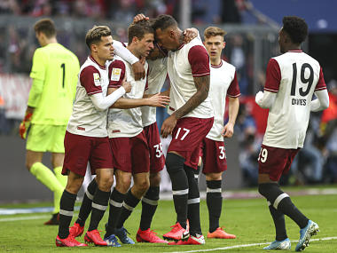 Bundesliga: Bayern Munich beat Augsburg to take 4-point lead in match marked by celebrations and protests Bundesliga: Bayern Munich beat Augsburg to take 4-point lead in match marked by celebrations and protests