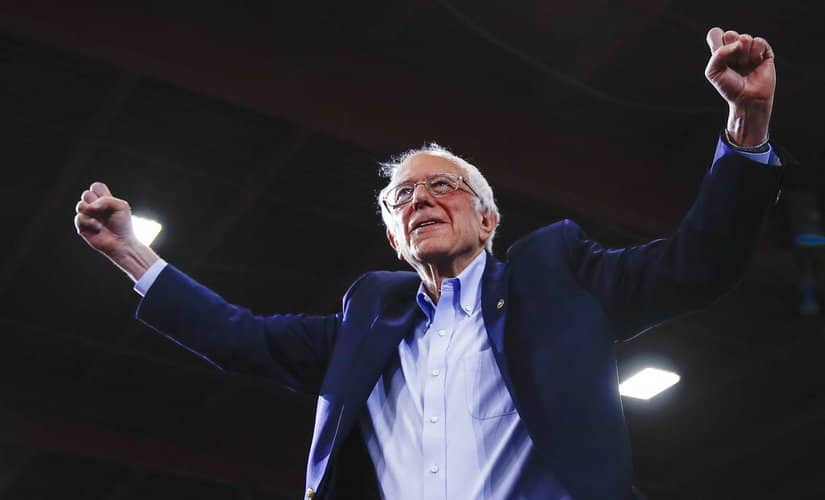 Democratic presidential candidate Sen. Bernie Sanders, I-Vt., arrives at a primary night election rally in Essex Junction, Vt., Tuesday, March 3, 2020. (AP Photo/Matt Rourke)