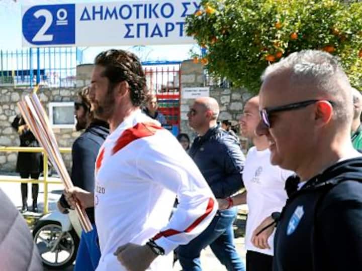 Coronavirus pandemic: Tokyo Olympics 2020 torch relay in Greece suspended as 'unexpectedly large crowd' gathers to watch