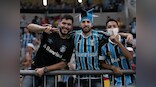 Coronavirus pandemic: Gremio players take to football field wearing masks after being forced to play