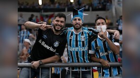 Coronavirus pandemic: Gremio players take to football field wearing masks after being forced to play