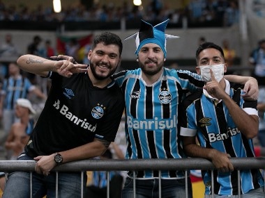 Coronavirus pandemic: Gremio players take to football field wearing masks after being forced to play