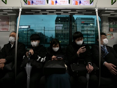 Singapore, praised for its COVID-19 response, goes into lockdown as cases rise Singapore, praised for its COVID-19 response, goes into lockdown as cases rise