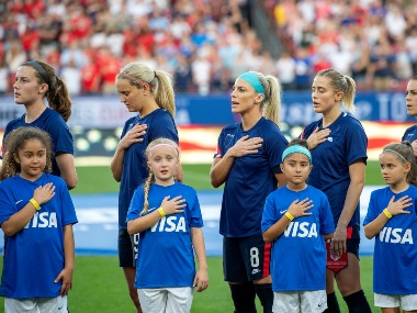 US Soccer apologises for arguments in equal pay case as women footballers hide federation's logo in apparent protest US Soccer apologises for arguments in equal pay case as women footballers hide federation's logo in apparent protest