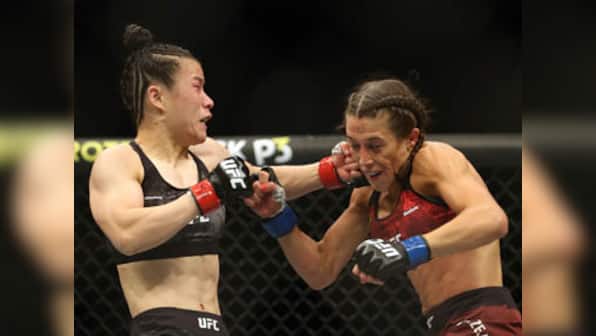 UFC 248: Zhang Weili retains strawweight belt in bruising battle against Joanna Jedrzedczyk; Israel Adesanya wins in snooze-fest