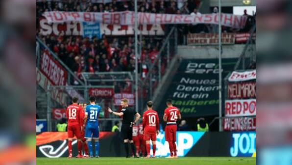 Bundesliga: Bayern Munich crush Hoffenheim 6-0 after game interrupted over banner