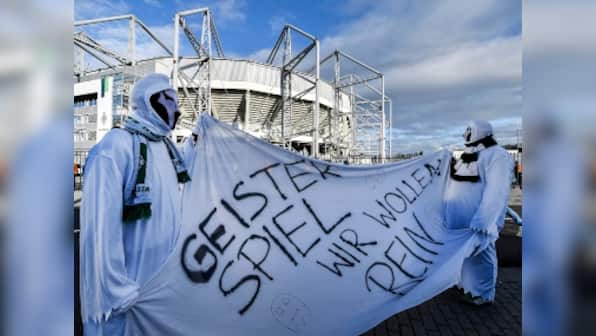 Coronavirus pandemic: 'Football without people is not football', say fans as calls to scrap rest of Bundesliga season intensify