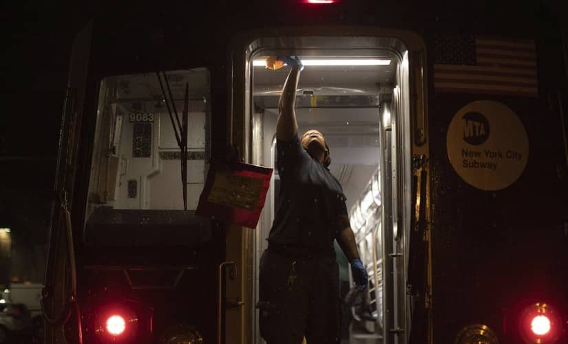 A worker sanitizes surfaces at the Coney Island Yard in the Brooklyn borough of New York. AP