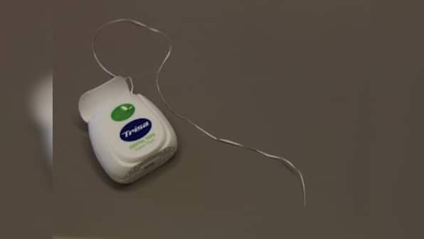 Brushing your teeth isn't enough: Here's why and how you need to floss daily