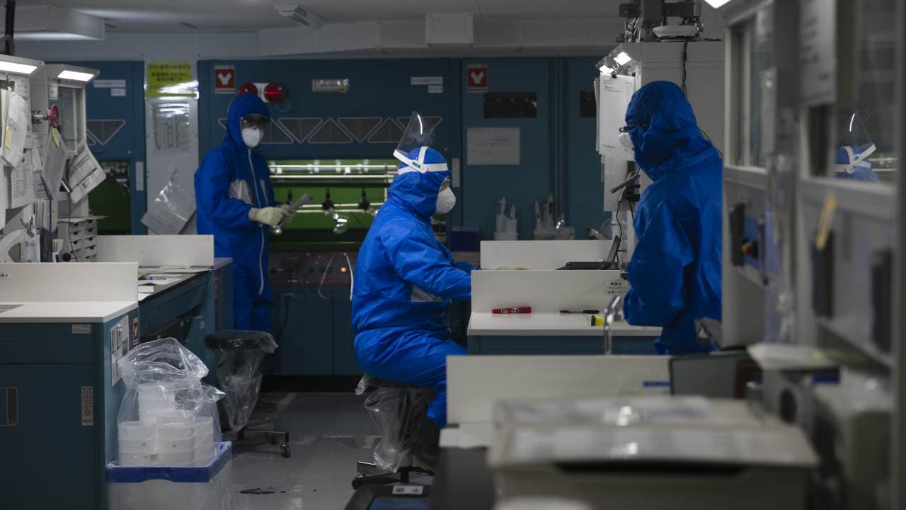Engineers analyze water samples in a lab at the Fukushima Dai-ichi nuclear power plant in Okuma, Fukushima Prefecture, Japan. Image credit: AP