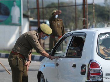 Coronavirus Outbreak: Authorities in Kashmir seal off containment zones; valid pass-holders allowed entry and exit, say officials Coronavirus Outbreak: Authorities in Kashmir seal off containment zones; valid pass-holders allowed entry and exit, say officials