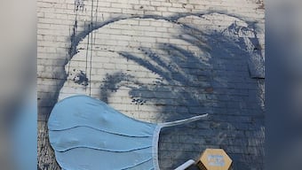 Coronavirus Outbreak: Banksy's mural, Girl with a Pierced Eardrum, based in his hometown Bristol now gets a face mask