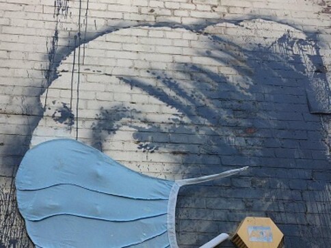 Coronavirus Outbreak: Banksy's mural, Girl with a Pierced Eardrum, based in his hometown Bristol now gets a face mask Coronavirus Outbreak: Banksy's mural, Girl with a Pierced Eardrum, based in his hometown Bristol now gets a face mask