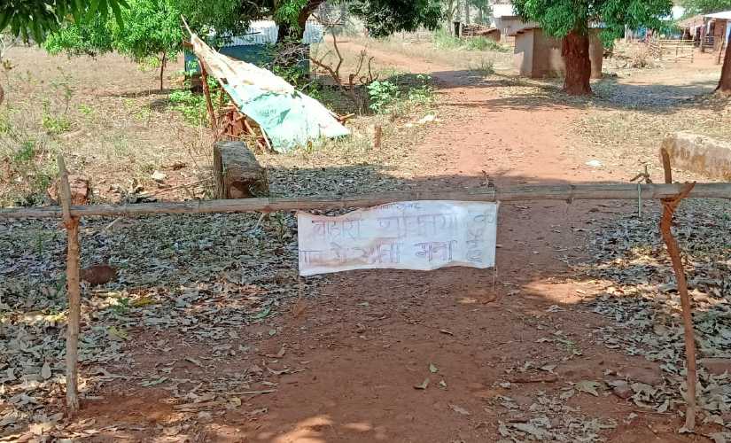 A village in Bastar self-quarantines by putting a fence at the entry. A hand written note warns outsiders against entering the village. Image procured by Debobrat Ghose/Firstpost