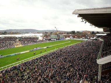 A general view from the Grand Stand as Envoi Allen ridden by Davy Russell wins the Ballymore Novices' Hurdle day two of the Cheltenham Horse Racing Festival at Cheltenham Racecourse, England. AP