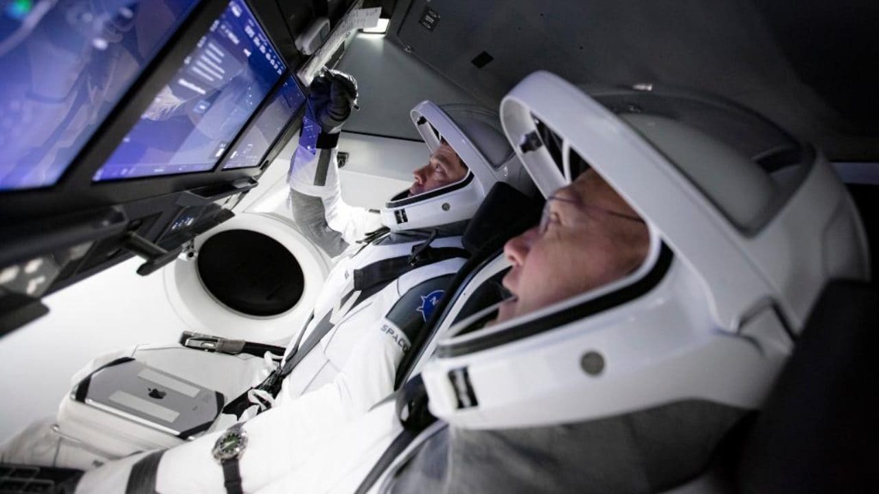 NASA astronauts during a pre-flight test in SpaceX Crew Dragon. Image credit: Twitter