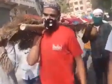 Muslim men help carry Hindu woman's bier in MP's Indore after relatives fail to attend funeral due to lockdown Muslim men help carry Hindu woman's bier in MP's Indore after relatives fail to attend funeral due to lockdown