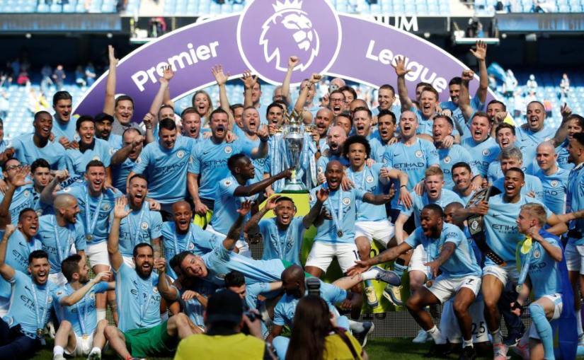 Manchester City players celebrate after winning the Premier League title in 2018. Reuters