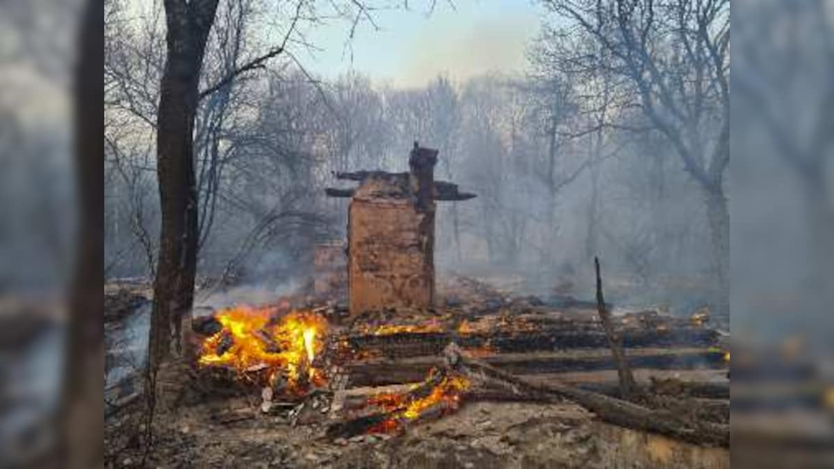 Ukrainian firefighters battle two blazes near Chernobyl nuclear power plant; over 60 acres of forest affected