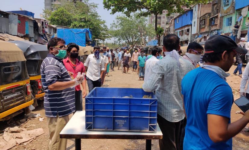 Since their upper middle class employers have sent them on unpaid leaves, the workers have to depend on the charity of NGOs and activists to get two square meals a day. Image/Parth MN