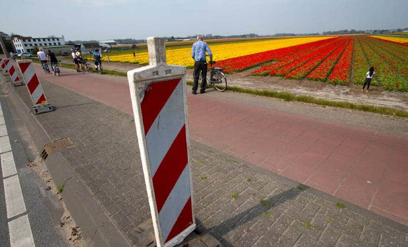 The Netherlands govt enforced stricter rules after people were seen venturing out to enjoy spring. AP 