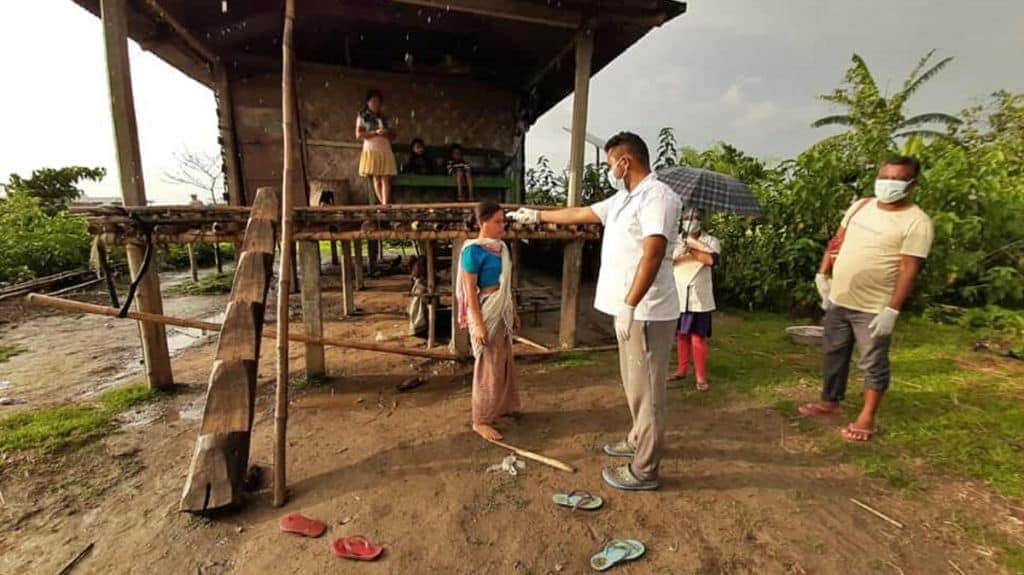 A health worker from the Jorhat Boat Clinic conducts community surveillance to check the spread of the pandemic. Photo from C-NES.