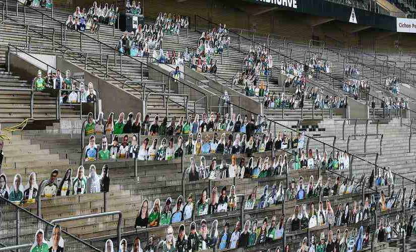 Portraits of fans of German Bundesliga soccer club Borussia Moenchengladbach are set on the supporters tribune in the stadium in Moenchengladbach, Germany, Thursday, April 16, 2020. All major events in Germany are suspended due to the coronavirus outbreak until the end of August, the German Bundesliga suspended all matches until April 30, 2020. (AP Photo/Martin Meissner)