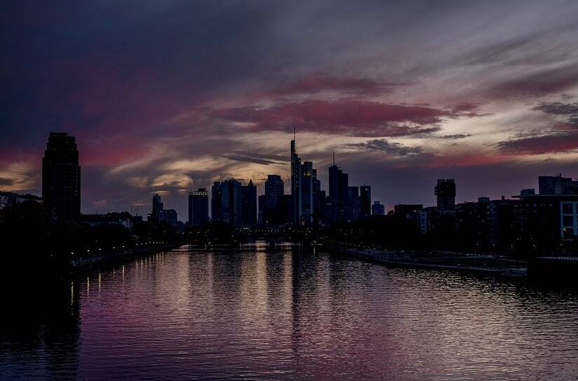 The sun has set behind the buildings of the banking district in Frankfurt, Germany. AP Photo