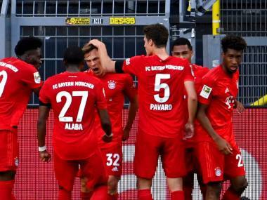 Joshua Kimmich celebrates with Bayern teammates after scoring. AP