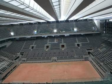 A general view of the Philippe-Chatrier tennis court with its new retractable roof during a media tour at Roland Garros stadium in Paris, Wednesday, May 27, 2020. The French open will moving to September from the end of May because of the outbreak of the COVID-19 disease. (AP Photo/Michel Euler)