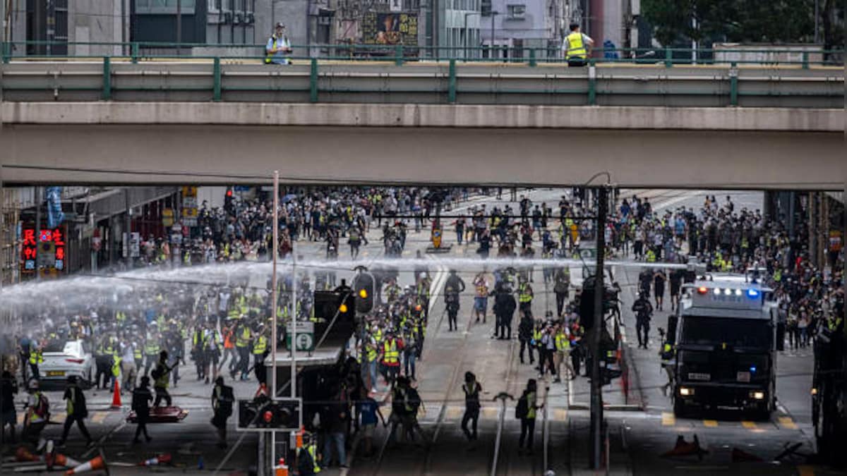 Hong Kong Police fires tear gas as protesters resist China's grip, launch first major demonstration after COVID-19 outbreak