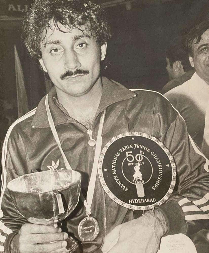 Manmeet Singh Walia with the winner’s trophy after winning the National Senior table Tennis Title.