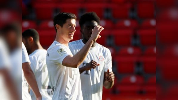 Bundesliga: Robert Lewandowski, Benjamin Pavard score as Bayern Munich win on return; Cologne held by Mainz