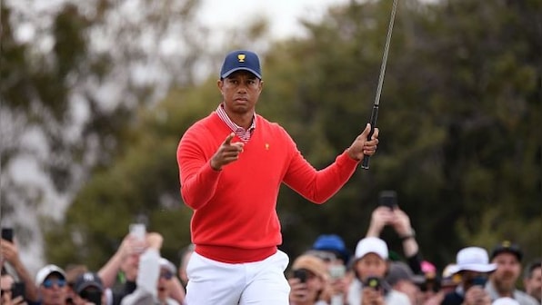 Tiger Woods, Peyton Manning hold off late challenge to beat Phil Mickelson and Tom Brady in charity golf match