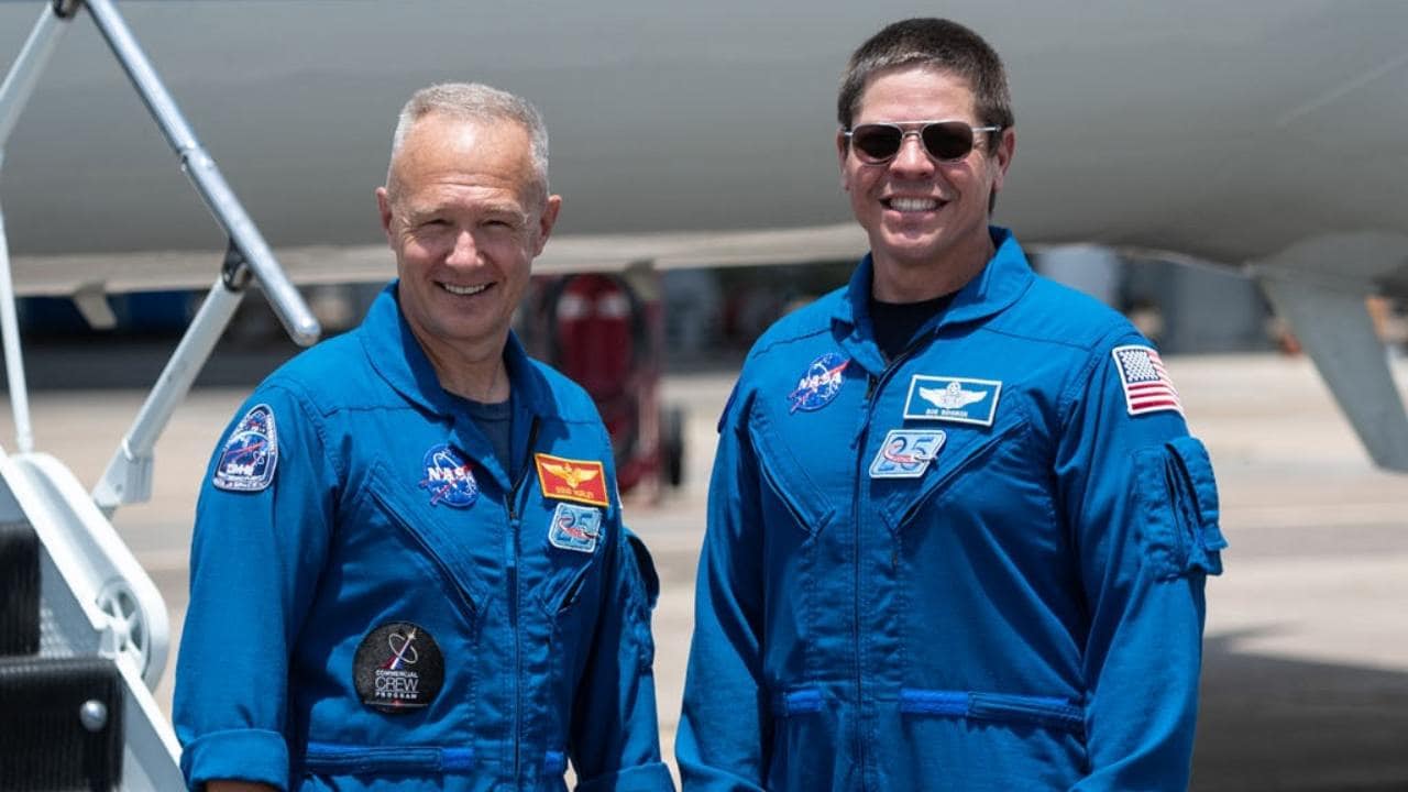 Astronauts Douglas Hurley (left) and Robert Behnken before boarding the Gulfstream jet that will carry them to Kennedy Space Center in Florida. Image credit: NASA/James Blair