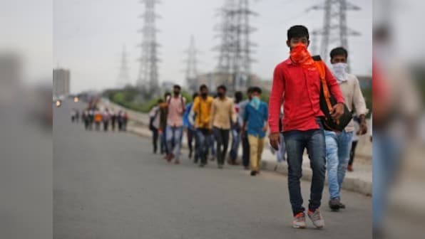 Agra DM draws flak for comparing picture of migrant child sleeping on suitcase to own childhood memory