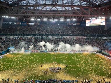 Fans cheer as Zenit team players celebrate their victory last year after the Russian premier league match between CSKA Moscow and Zenit in St. Petersburg, Russia. AP